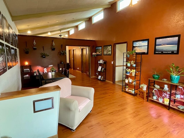 729 10th St E, Wabasha, MN 55981 - living area with wood finished floors, high vaulted ceiling, and beamed ceiling