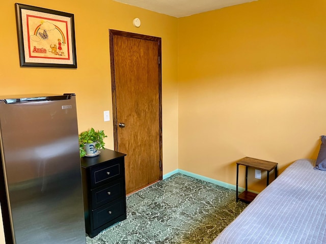 729 10th St E, Wabasha, MN 55981 - bedroom featuring freestanding refrigerator and baseboards