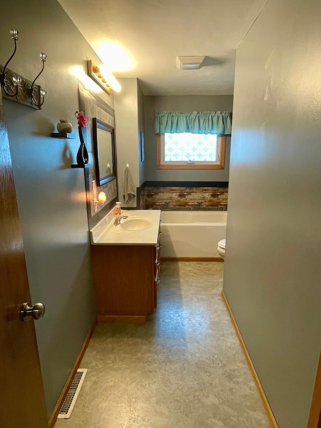 729 10th St E, Wabasha, MN 55981 - full bathroom with vanity, a bath, and toilet