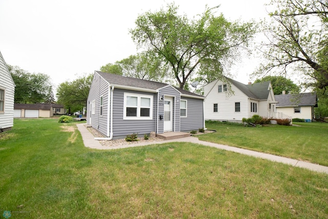 bungalow-style house featuring a front yard