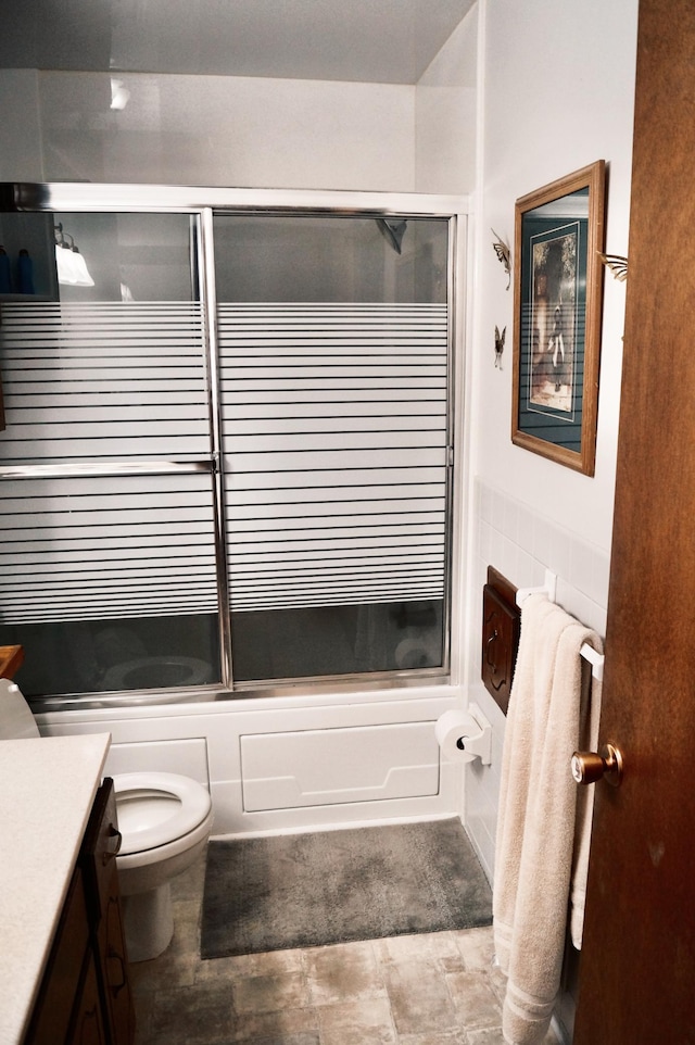 6449 Rice Ct, Lino Lakes, MN 55014 - bathroom featuring enclosed tub / shower combo, toilet, and vanity