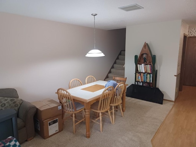 149 Riverview Dr Unit 5, Monticello, MN 55362 - dining space with stairs and light wood-type flooring