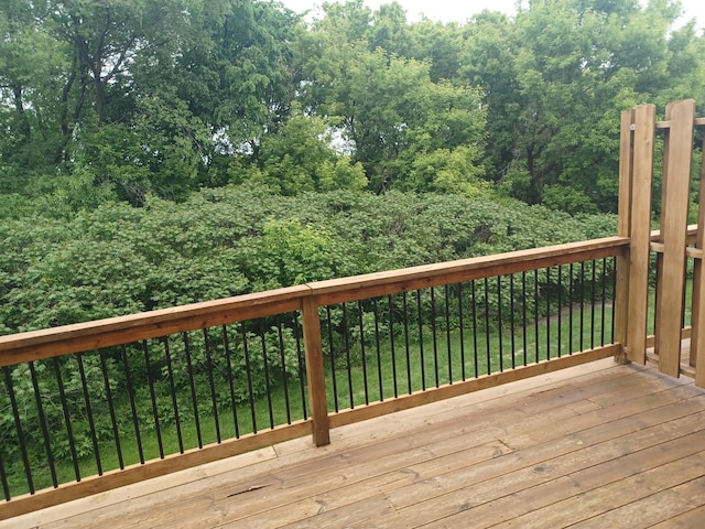 149 Riverview Dr Unit 5, Monticello, MN 55362 - deck featuring a view of trees