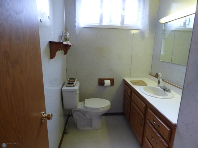 423 9th St N, Wahpeton, ND 58075 - bathroom with toilet and vanity