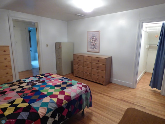 423 9th St N, Wahpeton, ND 58075 - bedroom with light wood-type flooring and baseboards