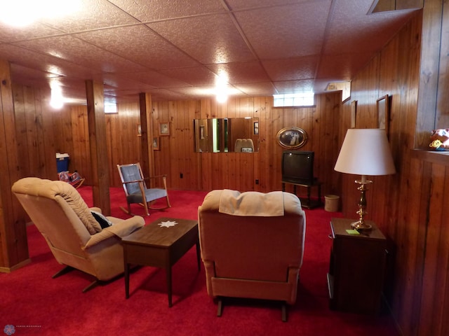 423 9th St N, Wahpeton, ND 58075 - living room with carpet flooring and wood walls
