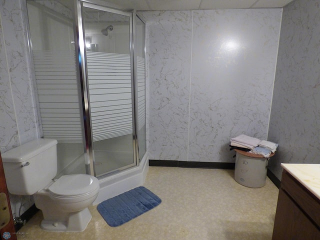 423 9th St N, Wahpeton, ND 58075 - bathroom with vanity, toilet, and a shower stall