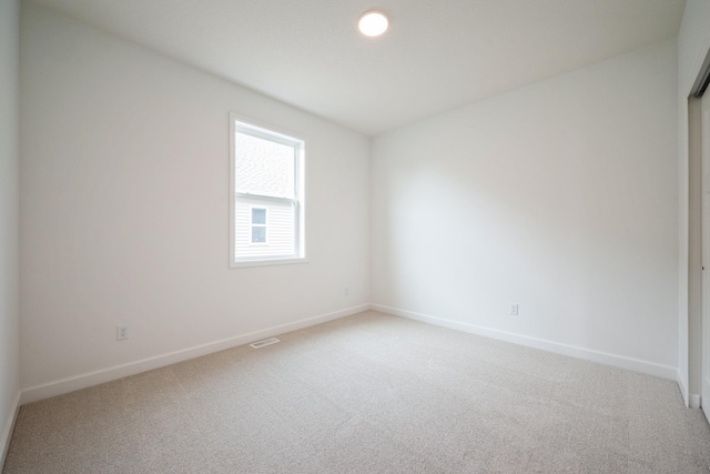 11405 Fieldstone Dr, Rogers, MN 55311 - empty room featuring light carpet and baseboards