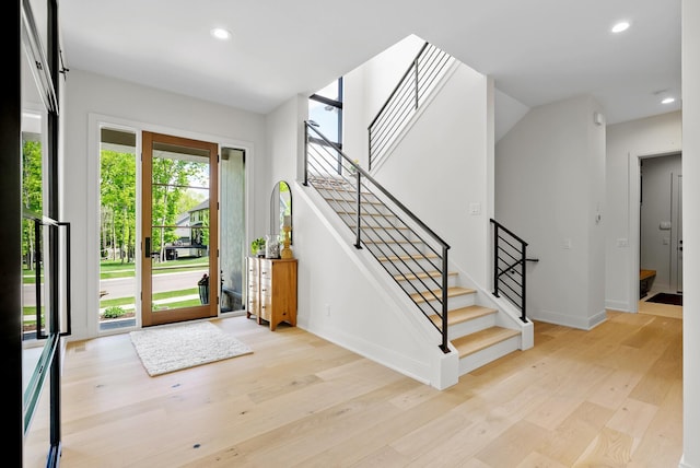 6407 Archer Ln N, Maple Grove, MN 55311 - entryway with light wood-style flooring, recessed lighting, stairs, and baseboards