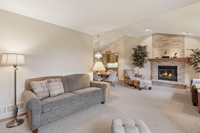 124 166th Ave NE, Andover, MN 55304 - carpeted living room with a brick fireplace, vaulted ceiling, and baseboards