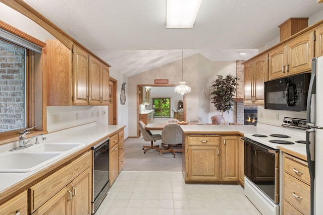 124 166th Ave NE, Andover, MN 55304 - kitchen featuring black appliances, a sink, lofted ceiling, a peninsula, and light countertops
