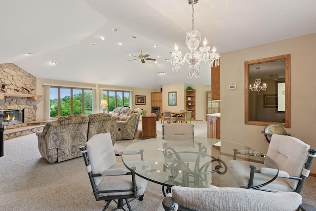 124 166th Ave NE, Andover, MN 55304 - dining space featuring a chandelier, vaulted ceiling, light colored carpet, a fireplace, and recessed lighting
