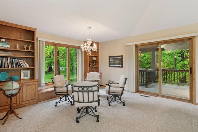 124 166th Ave NE, Andover, MN 55304 - carpeted dining room featuring a chandelier and lofted ceiling