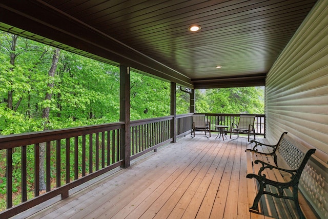 124 166th Ave NE, Andover, MN 55304 - wooden deck featuring a forest view