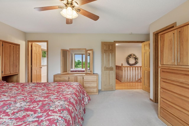 124 166th Ave NE, Andover, MN 55304 - bedroom with light colored carpet and a ceiling fan