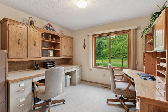 124 166th Ave NE, Andover, MN 55304 - office space featuring built in desk, a textured ceiling, light colored carpet, and baseboards