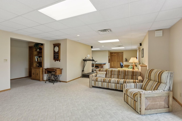 124 166th Ave NE, Andover, MN 55304 - living room with light colored carpet, baseboards, and a drop ceiling
