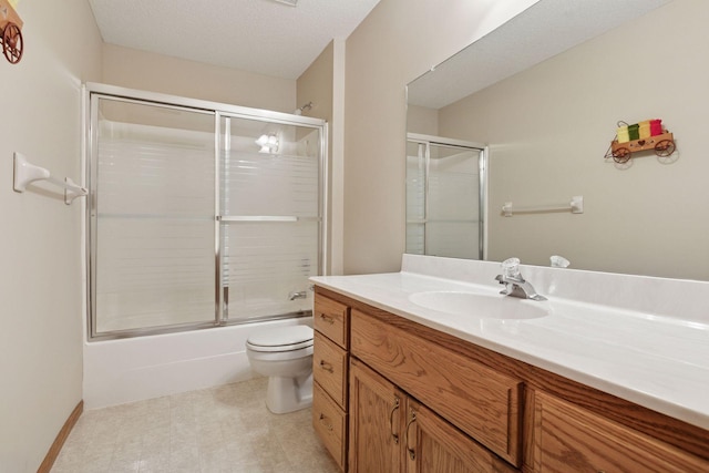 124 166th Ave NE, Andover, MN 55304 - full bathroom with toilet, vanity, bath / shower combo with glass door, and tile patterned floors