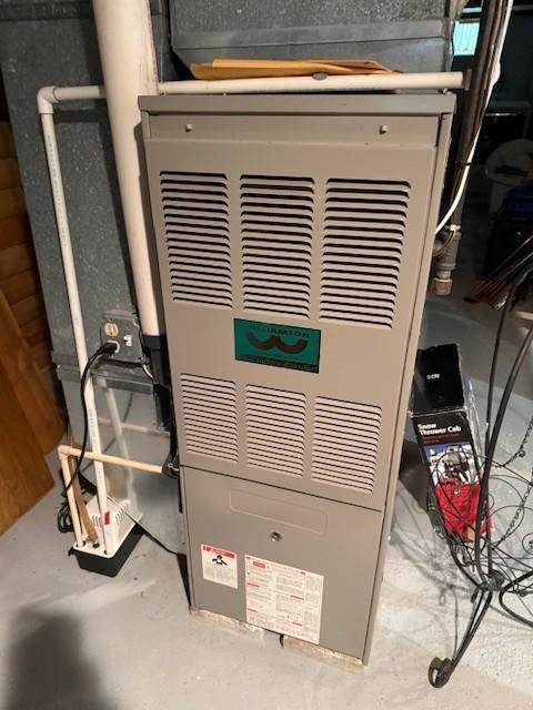 106 Morningside Rd, Albert Lea, MN 56007 - utility room featuring heating unit