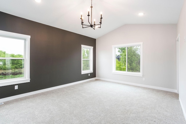 415 Moelter Ln, Troy Twp, WI 54016 - carpeted spare room featuring a chandelier, baseboards, and vaulted ceiling