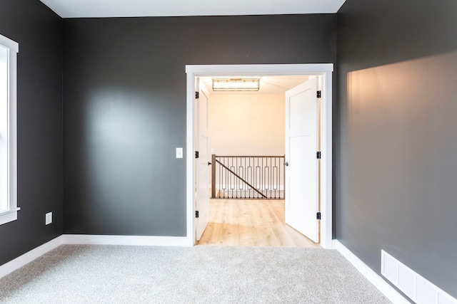 415 Moelter Ln, Troy Twp, WI 54016 - carpeted spare room featuring baseboards