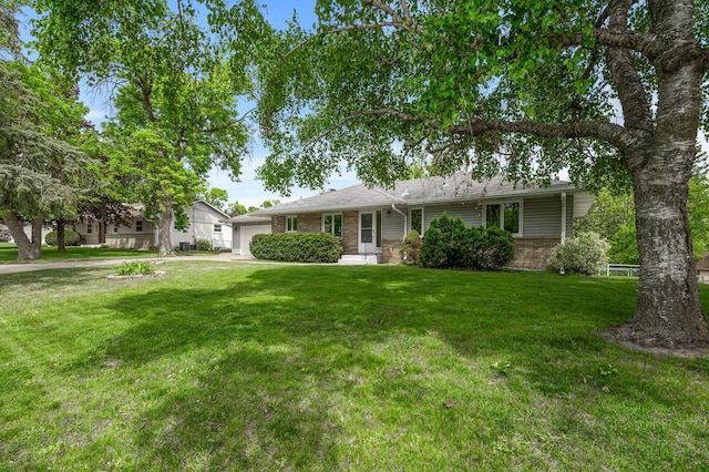 1213 Highview Dr, New Brighton, MN 55112 - single story home featuring a garage, brick siding, a front yard, and driveway