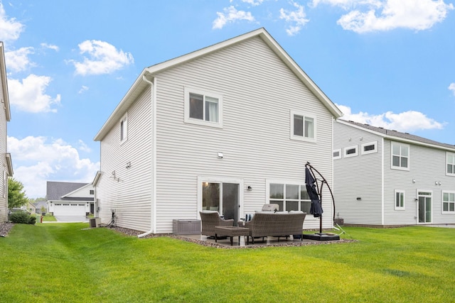 8857 152nd Ln NW, Ramsey, MN 55303 - back of house featuring an outdoor hangout area and a lawn