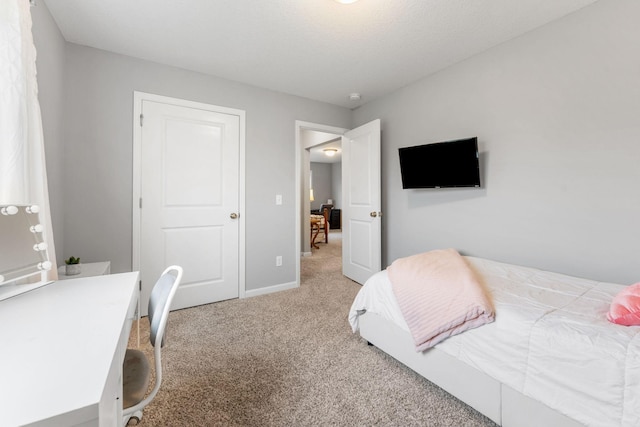 8857 152nd Ln NW, Ramsey, MN 55303 - bedroom with carpet flooring and baseboards
