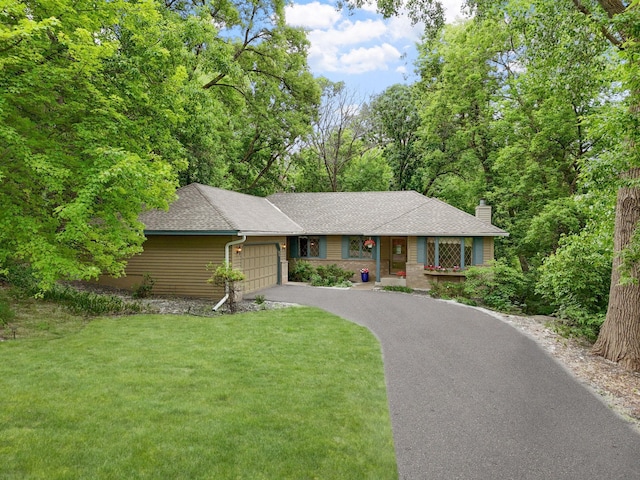 1527 Clarendon Dr, Minnetonka, MN 55391 - ranch-style house featuring an attached garage, a front yard, driveway, a chimney, and a shingled roof