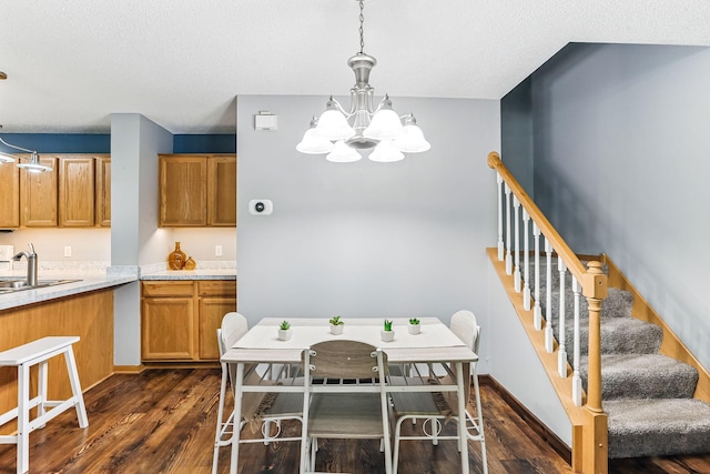 10938 181st Ln NW, Elk River, MN 55330 - dining room with a chandelier, dark wood finished floors, stairway, a textured ceiling, and baseboards
