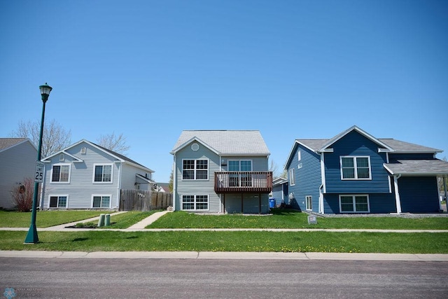 view of front of property with a wooden deck