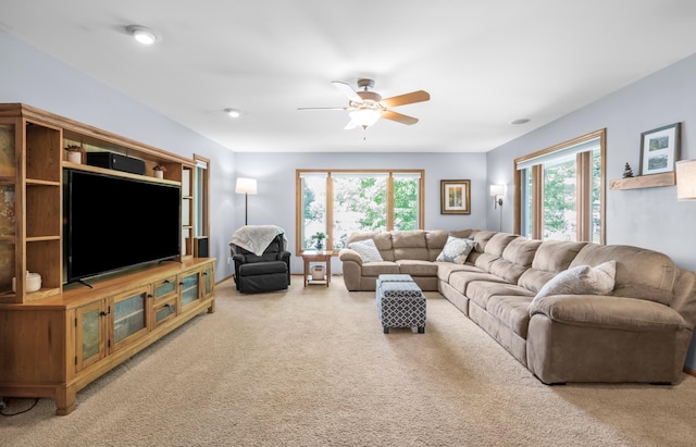 7712 Bester Ave, Inver Grove Heights, MN 55076 - carpeted living area with ceiling fan and healthy amount of natural light