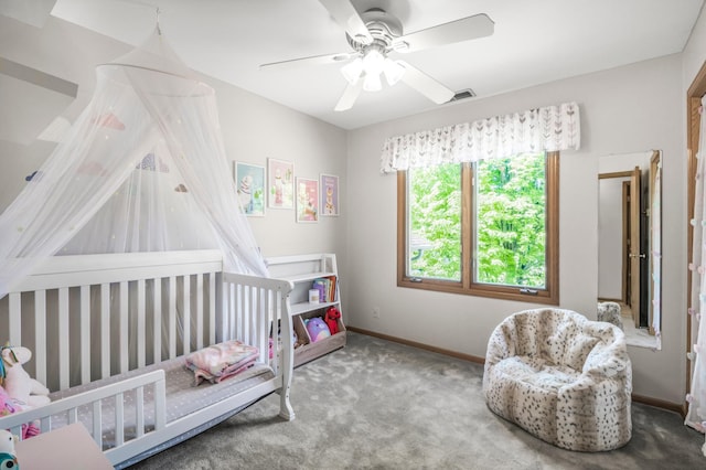 7712 Bester Ave, Inver Grove Heights, MN 55076 - carpeted bedroom featuring baseboards, a ceiling fan, and a crib