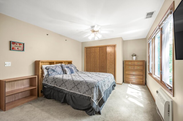 7712 Bester Ave, Inver Grove Heights, MN 55076 - bedroom featuring light colored carpet, a closet, and multiple windows