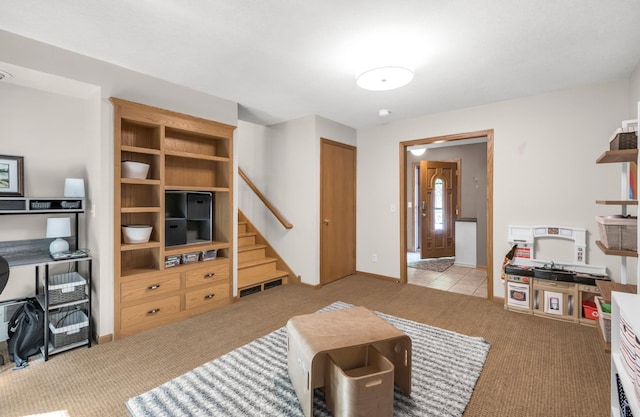 7712 Bester Ave, Inver Grove Heights, MN 55076 - living room with carpet floors, stairway, and baseboards