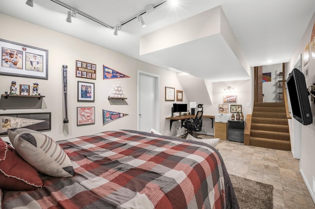 7712 Bester Ave, Inver Grove Heights, MN 55076 - bedroom with rail lighting, light stone finish flooring, and a desk