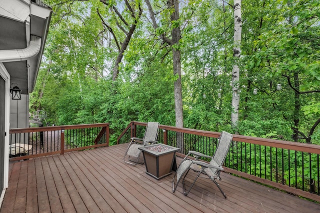 7712 Bester Ave, Inver Grove Heights, MN 55076 - deck with a fire pit