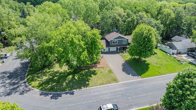 7712 Bester Ave, Inver Grove Heights, MN 55076 - aerial view of property and surrounding area with a heavily wooded area