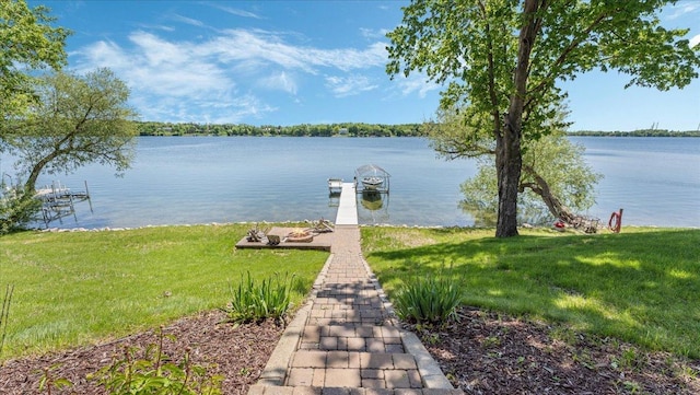 1219 Latoka Dr SW, Alexandria, MN 56308 - dock area with a water view and a lawn