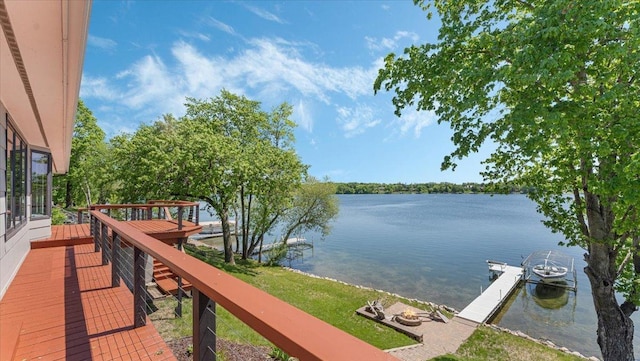 1219 Latoka Dr SW, Alexandria, MN 56308 - deck featuring a water view and a boat dock