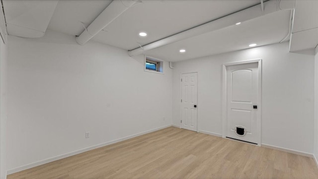 1219 Latoka Dr SW, Alexandria, MN 56308 - below grade area featuring light wood-style floors, recessed lighting, and baseboards