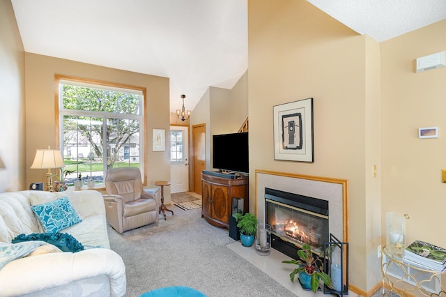 8766 Benson Way Unit 84, Inver Grove Heights, MN 55076 - carpeted living area with a fireplace with flush hearth and a chandelier