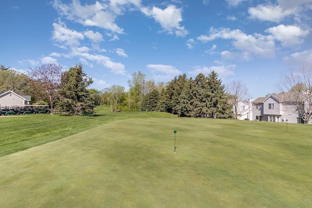 8766 Benson Way Unit 84, Inver Grove Heights, MN 55076 - surrounding community featuring an area to practice putting, golf course view, and a yard