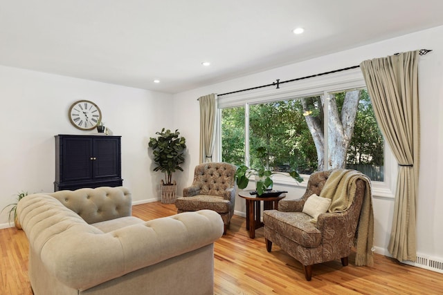 5240 Birch Rd, Minnetonka, MN 55345 - living room featuring light wood-type flooring, recessed lighting, and baseboards