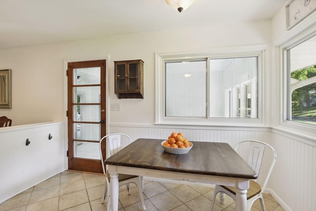 5240 Birch Rd, Minnetonka, MN 55345 - dining room featuring wainscoting and light tile patterned floors