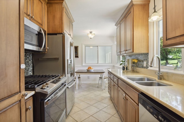 5240 Birch Rd, Minnetonka, MN 55345 - kitchen with appliances with stainless steel finishes, a sink, backsplash, and brown cabinets
