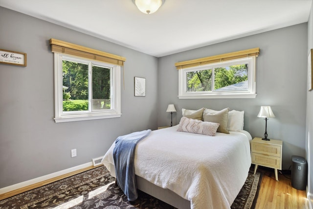 5240 Birch Rd, Minnetonka, MN 55345 - bedroom featuring wood finished floors and baseboards