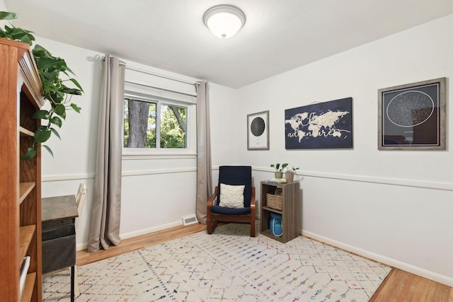 5240 Birch Rd, Minnetonka, MN 55345 - sitting room featuring wood finished floors and baseboards