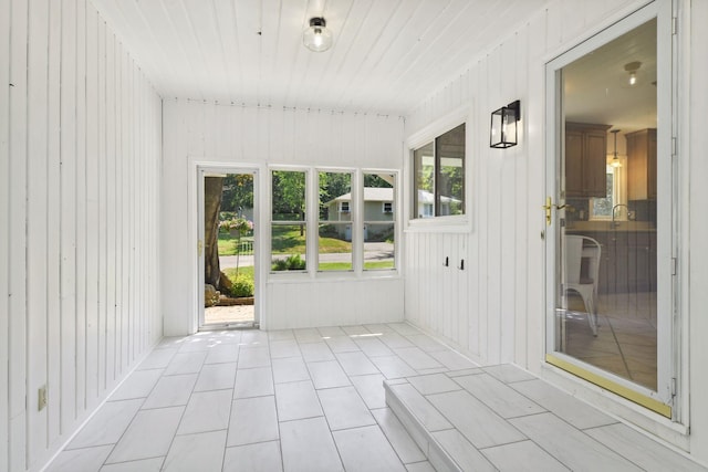 5240 Birch Rd, Minnetonka, MN 55345 - unfurnished sunroom featuring plenty of natural light