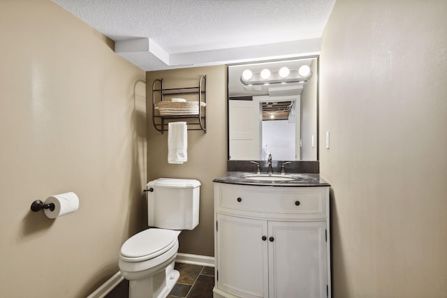 5240 Birch Rd, Minnetonka, MN 55345 - half bath with toilet, vanity, baseboards, and a textured ceiling